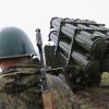 НАТО против России (Военнослужащий у берегового ракетного комплекса Бал перед запуском противокарабельной крылатой ракет…) Военнослужащий у бер…