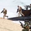 Забудьте о британском потенциале ядерного сдерживания (Морпехи Британских Королевский военных сил совместно с португальскими морпехами высаживаются из лодк…) Морпехи Британских К…