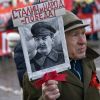 Сталин и примирение граждан с историей (Участник шествия и митинга КПРФ | © РИА Новости / Евгений Биятов) Участник шествия и м…