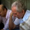 Обещанных пенсий не будет: 'Радуйтесь, что имеете работу' (Пенсионеры ожидают открытия банка в Афинах, Греция. Архивное фото | © AP Photo / Emilio Morenatti) Пенсионеры ожидают о…
