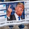Трамп превратился в 'отморозка' (На фото: протестующий держит плакат во время митингов в США (Фото: ZumaTAСС)) На фото: протестующи…