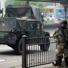 В Миннеаполисе беспорядки, в город введена нацгвардия (Военнослужащий Национальной гвардии США в Миннеаполисе | © REUTERS / Carlos Barria) Военнослужащий Нацио…
