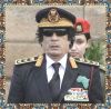 Всемирная 'оранжевая революция' продолжается (Лидер свободного мира Муаммар Каддафи) Лидер свободного мир…