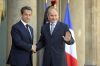 Саркози и Абдель Джалиль